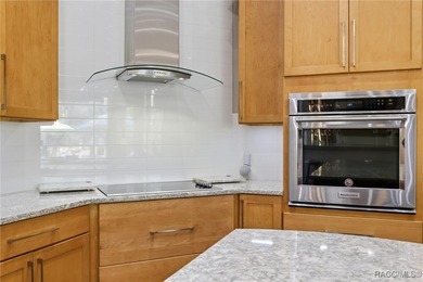 Experience elevated Florida living in this beautifully designed on Southern Woods Golf Club in Florida - for sale on GolfHomes.com, golf home, golf lot