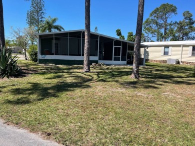 TIRED OF SNOW,ICE AND COLD, TRADE IT IN FOR SUN,WARM AND WHITE on Lake Fairways Country Club in Florida - for sale on GolfHomes.com, golf home, golf lot
