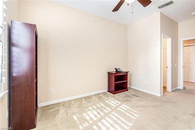 Discover exceptional value in this true four-bedroom residence on The Colony Golf and Country Club in Florida - for sale on GolfHomes.com, golf home, golf lot