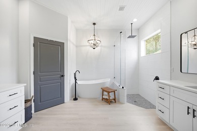 Imagine ending your day on the covered lanai, grilling in the on St. Johns Golf and Country Club in Florida - for sale on GolfHomes.com, golf home, golf lot