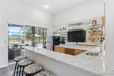 Experience elevated Florida living in this beautifully designed on Southern Woods Golf Club in Florida - for sale on GolfHomes.com, golf home, golf lot