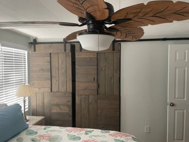 TIRED OF SNOW,ICE AND COLD, TRADE IT IN FOR SUN,WARM AND WHITE on Lake Fairways Country Club in Florida - for sale on GolfHomes.com, golf home, golf lot