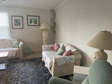 TIRED OF SNOW,ICE AND COLD, TRADE IT IN FOR SUN,WARM AND WHITE on Lake Fairways Country Club in Florida - for sale on GolfHomes.com, golf home, golf lot