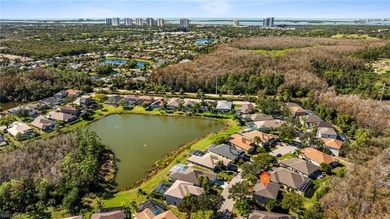 Discover exceptional value in this true four-bedroom residence on The Colony Golf and Country Club in Florida - for sale on GolfHomes.com, golf home, golf lot