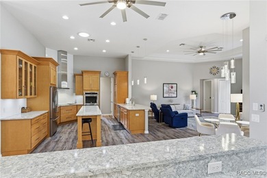 Experience elevated Florida living in this beautifully designed on Southern Woods Golf Club in Florida - for sale on GolfHomes.com, golf home, golf lot