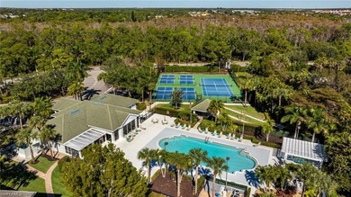 Discover exceptional value in this true four-bedroom residence on The Colony Golf and Country Club in Florida - for sale on GolfHomes.com, golf home, golf lot
