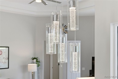 Experience elevated Florida living in this beautifully designed on Southern Woods Golf Club in Florida - for sale on GolfHomes.com, golf home, golf lot