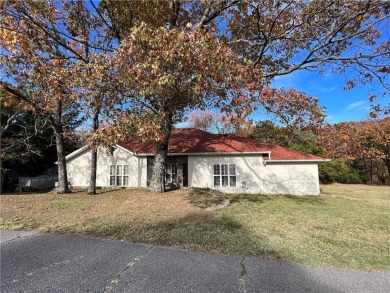 Paradise awaits just off the 14th Fairway! This immaculately on Holiday Island Golf Course in Arkansas - for sale on GolfHomes.com, golf home, golf lot