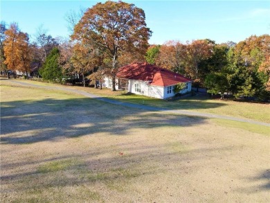 Paradise awaits just off the 14th Fairway! This immaculately on Holiday Island Golf Course in Arkansas - for sale on GolfHomes.com, golf home, golf lot