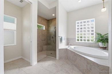 Experience elevated Florida living in this beautifully designed on Southern Woods Golf Club in Florida - for sale on GolfHomes.com, golf home, golf lot