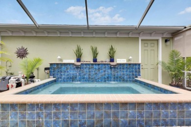 624 Winterside Drive | 4 Beds | 3 Baths | 3-Car Garage | 2,558 on Apollo Beach Golf and Sea Club in Florida - for sale on GolfHomes.com, golf home, golf lot