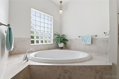 Experience elevated Florida living in this beautifully designed on Southern Woods Golf Club in Florida - for sale on GolfHomes.com, golf home, golf lot