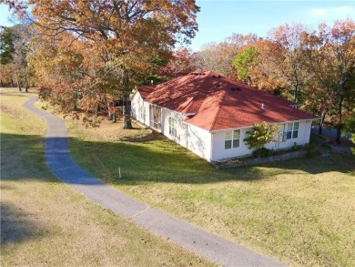 Paradise awaits just off the 14th Fairway! This immaculately on Holiday Island Golf Course in Arkansas - for sale on GolfHomes.com, golf home, golf lot