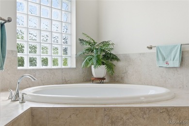 Experience elevated Florida living in this beautifully designed on Southern Woods Golf Club in Florida - for sale on GolfHomes.com, golf home, golf lot