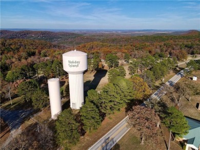 Paradise awaits just off the 14th Fairway! This immaculately on Holiday Island Golf Course in Arkansas - for sale on GolfHomes.com, golf home, golf lot