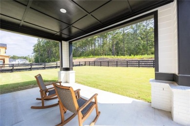 Welcome home to this executive home built by the Toll Brothers on Capital City Club Crabapple in Georgia - for sale on GolfHomes.com, golf home, golf lot