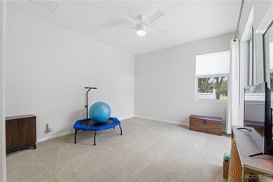 Experience elevated Florida living in this beautifully designed on Southern Woods Golf Club in Florida - for sale on GolfHomes.com, golf home, golf lot