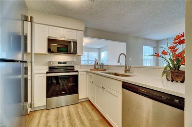 Beautifully renovated first floor unit with new flooring on Honey Bee Golf Club in Virginia - for sale on GolfHomes.com, golf home, golf lot