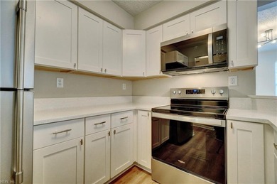 Beautifully renovated first floor unit with new flooring on Honey Bee Golf Club in Virginia - for sale on GolfHomes.com, golf home, golf lot