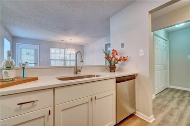 Beautifully renovated first floor unit with new flooring on Honey Bee Golf Club in Virginia - for sale on GolfHomes.com, golf home, golf lot