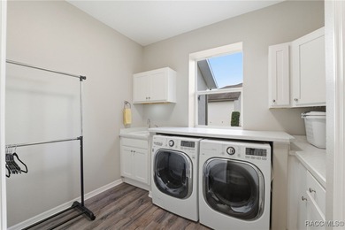 Experience elevated Florida living in this beautifully designed on Southern Woods Golf Club in Florida - for sale on GolfHomes.com, golf home, golf lot