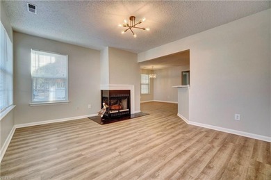 Beautifully renovated first floor unit with new flooring on Honey Bee Golf Club in Virginia - for sale on GolfHomes.com, golf home, golf lot