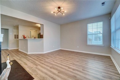 Beautifully renovated first floor unit with new flooring on Honey Bee Golf Club in Virginia - for sale on GolfHomes.com, golf home, golf lot