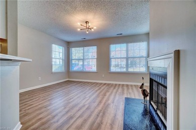 Beautifully renovated first floor unit with new flooring on Honey Bee Golf Club in Virginia - for sale on GolfHomes.com, golf home, golf lot