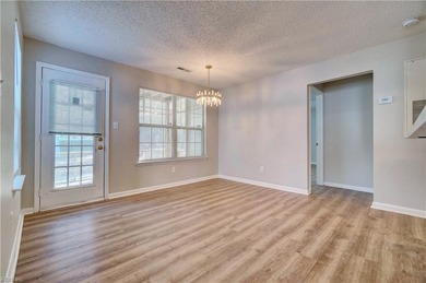 Beautifully renovated first floor unit with new flooring on Honey Bee Golf Club in Virginia - for sale on GolfHomes.com, golf home, golf lot