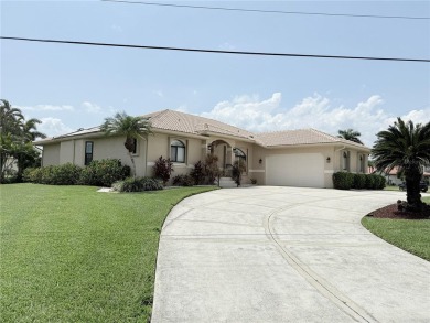 Impressive WATERFRONT home on an oversized lot in desirable deed on Twin Isles Country Club in Florida - for sale on GolfHomes.com, golf home, golf lot