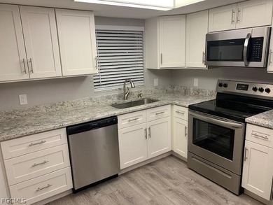 First-floor end unit in desirable Cross Creek Country Club - no on Cross Creek Country Club in Florida - for sale on GolfHomes.com, golf home, golf lot