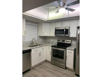 First-floor end unit in desirable Cross Creek Country Club - no on Cross Creek Country Club in Florida - for sale on GolfHomes.com, golf home, golf lot