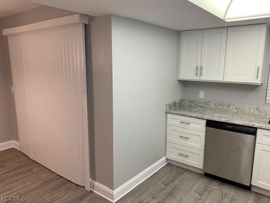 First-floor end unit in desirable Cross Creek Country Club - no on Cross Creek Country Club in Florida - for sale on GolfHomes.com, golf home, golf lot