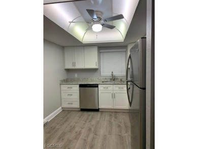 First-floor end unit in desirable Cross Creek Country Club - no on Cross Creek Country Club in Florida - for sale on GolfHomes.com, golf home, golf lot