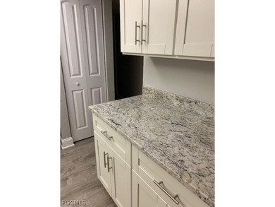 First-floor end unit in desirable Cross Creek Country Club - no on Cross Creek Country Club in Florida - for sale on GolfHomes.com, golf home, golf lot