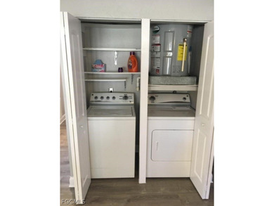 First-floor end unit in desirable Cross Creek Country Club - no on Cross Creek Country Club in Florida - for sale on GolfHomes.com, golf home, golf lot