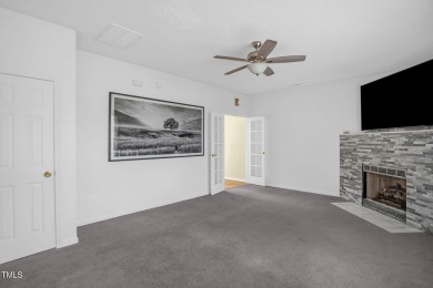 This beautifully updated home features a spacious living area on Hedingham Golf and Athletic Club in North Carolina - for sale on GolfHomes.com, golf home, golf lot