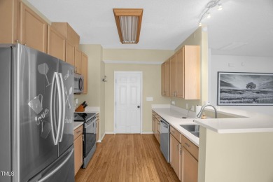This beautifully updated home features a spacious living area on Hedingham Golf and Athletic Club in North Carolina - for sale on GolfHomes.com, golf home, golf lot