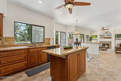 Nestled along a scenic double fairway in the heart of Ocotillo on Ocotillo Golf Resort  in Arizona - for sale on GolfHomes.com, golf home, golf lot