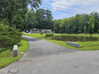 Retirement Home! Home is near multiple beaches and various Golf on Jacksonville Country Club in North Carolina - for sale on GolfHomes.com, golf home, golf lot