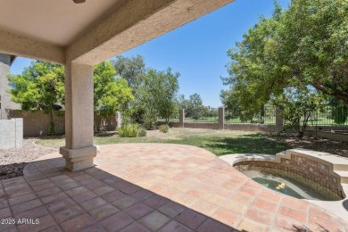 Nestled along a scenic double fairway in the heart of Ocotillo on Ocotillo Golf Resort  in Arizona - for sale on GolfHomes.com, golf home, golf lot