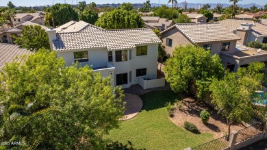 Nestled along a scenic double fairway in the heart of Ocotillo on Ocotillo Golf Resort  in Arizona - for sale on GolfHomes.com, golf home, golf lot