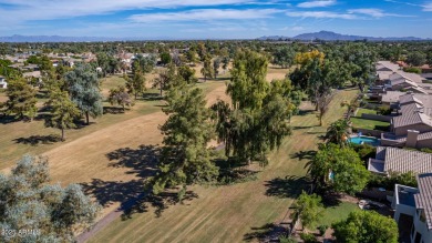 Nestled along a scenic double fairway in the heart of Ocotillo on Ocotillo Golf Resort  in Arizona - for sale on GolfHomes.com, golf home, golf lot