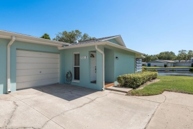 RARE OPPORTUNITY TO OWN A WATERFRONT CORNER VILLA NESTLED IN on Highland Lakes Executive Golf Course in Florida - for sale on GolfHomes.com, golf home, golf lot