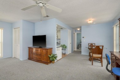 RARE OPPORTUNITY TO OWN A WATERFRONT CORNER VILLA NESTLED IN on Highland Lakes Executive Golf Course in Florida - for sale on GolfHomes.com, golf home, golf lot