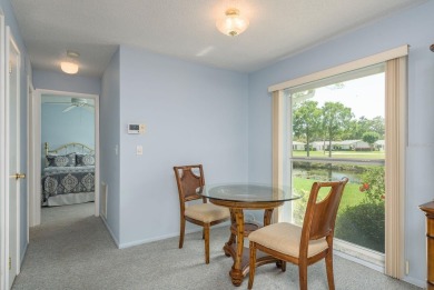 RARE OPPORTUNITY TO OWN A WATERFRONT CORNER VILLA NESTLED IN on Highland Lakes Executive Golf Course in Florida - for sale on GolfHomes.com, golf home, golf lot