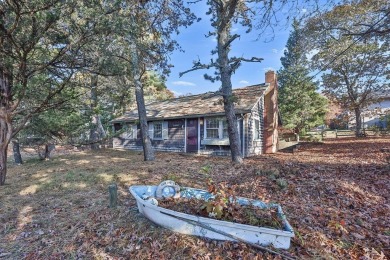 Discover a rare gem - a 3-bedroom ranch in a coveted location on Little Harbor Country Club in Massachusetts - for sale on GolfHomes.com, golf home, golf lot