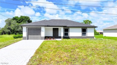 BRAND NEW CONSTRUCTION ON A FRESHWATER CANAL LOT WITH A GREAT on Mirror Lakes Golf Club in Florida - for sale on GolfHomes.com, golf home, golf lot