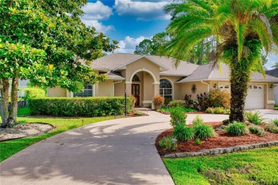 Experience refined Florida living in this meticulously on The Grand Club - Pine Lakes Course in Florida - for sale on GolfHomes.com, golf home, golf lot