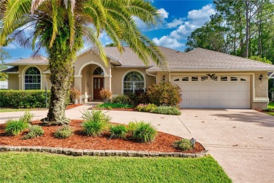 Experience refined Florida living in this meticulously on The Grand Club - Pine Lakes Course in Florida - for sale on GolfHomes.com, golf home, golf lot